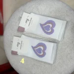 جوراب ورزشی ساقدار طرحدار سفید بنفش
